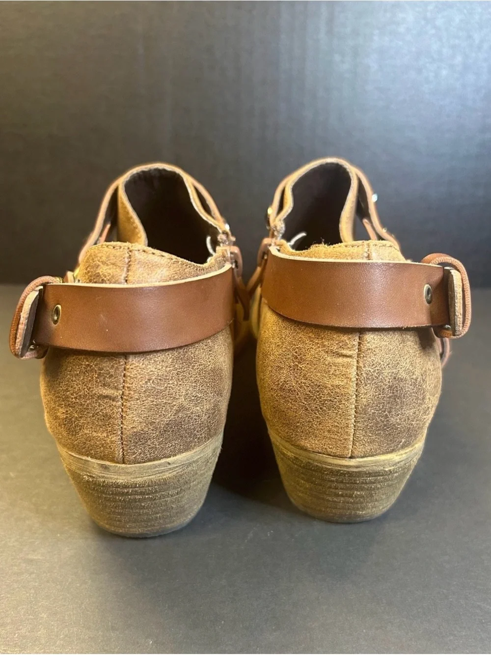 Woman’s Brown Leather Slip-On Boots with Decorative Gem Strap